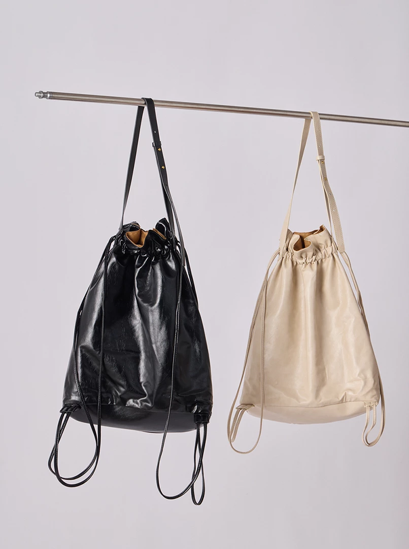 休閒抽繩肩背包