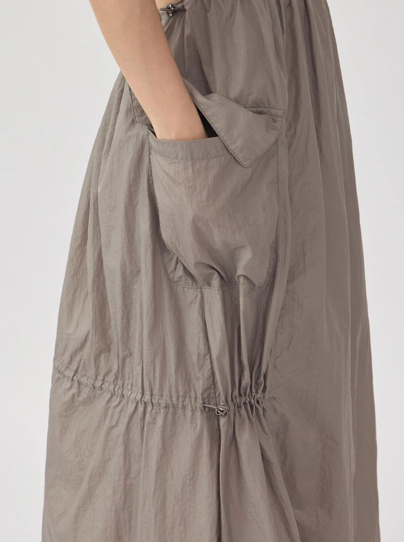 露背抽繩口袋長洋